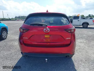 2021 Mazda CX-5 Touring with VIN JM3KFACMXM0462381, listed as a IAAI auction lot 40993844 with 53,528 mi miles. Bid and sale history available at carsss.com. Image 15.