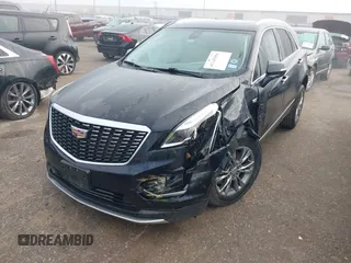 2021 Cadillac XT5 FWD Premium Luxury with VIN 1GYKNCRS2MZ185678, listed as a IAAI auction lot 41143084 with 25,399 mi miles and . Bid and sale history available at carsss.com. Image 2.