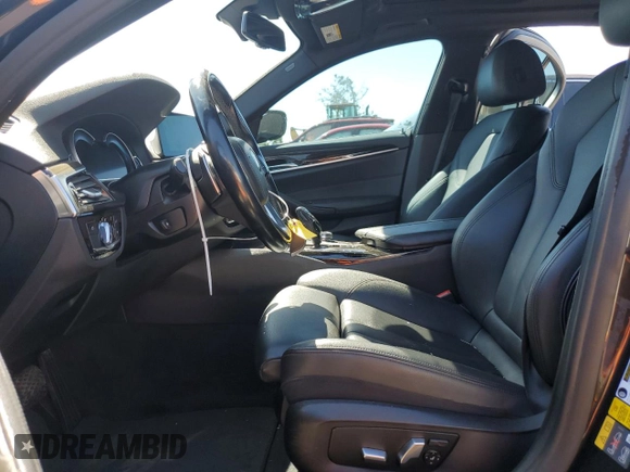 2018 BMW 5 Series 530e with VIN WBAJA9C52JB249402, listed as a Copart auction lot 55093055 with 117,033 mi miles and Salvage title. Bid and sale history available at DreamBid. Image 7.