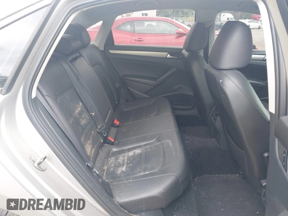 2014 Volkswagen Passat SE z VIN 1VWBN7A36EC045247, wystawiony jako IAAI lot #42295047 z przebiegiem 118 431 mil mil oraz . Historia ofert i sprzedaży dostępna na DreamBid. Obrazek 8.