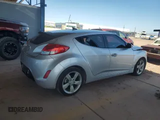 2014 Hyundai Veloster z VIN KMHTC6AD7EU216819, wystawiony jako Copart lot #57135335 z przebiegiem 104 588 mil mil oraz Szkoda całkowita • Salvage title. Historia ofert i sprzedaży dostępna na DreamBid. Obrazek 3.