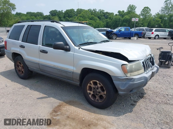 2002 Jeep Grand Cherokee Laredo with VIN 1J4GW48SX2C313093, listed as a IAAI auction lot 42446559 with 200,319 mi miles and . Bid and sale history available at DreamBid. Image 1.