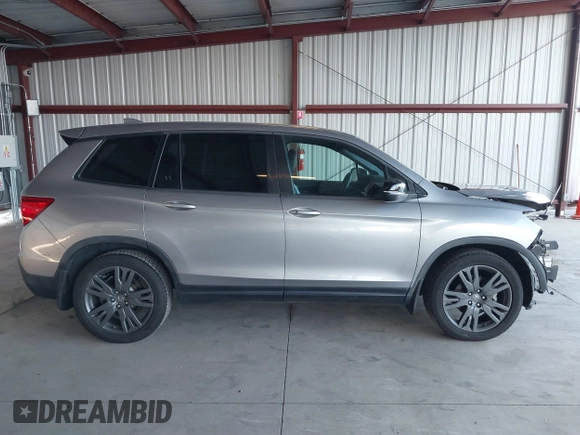 2019 Honda Passport EX-L with VIN 5FNYF7H58KB001928, listed as a IAAI auction lot 41862168 with 102,743 mi miles and . Bid and sale history available at carsss.com. Image 14.