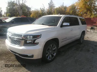 2015 Chevrolet Suburban LTZ with VIN 1GNSKKKC0FR551031, listed as a IAAI auction lot 40694559 with 184,261 mi miles. Bid and sale history available at carsss.com. Image 17.