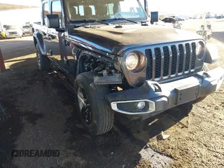 2021 Jeep Gladiator Willys with VIN 1C6HJTAG2ML507426, listed as a IAAI auction lot 41407608 with 49,554 mi miles and . Bid and sale history available at carsss.com. Image 6.