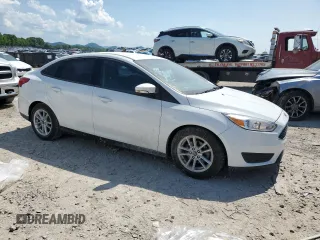 2017 Ford Focus SE with VIN 1FADP3F21HL255540, listed as a Copart auction lot 55151245 with 112,161 mi miles and Salvage Title. Bid and sale history available at DreamBid. Image 4.