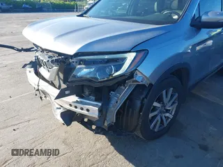 2020 Honda Pilot EX-L z VIN 5FNYF5H51LB016163, wystawiony jako IAAI lot #42030430 z przebiegiem 65 383 mil mil oraz . Historia ofert i sprzedaży dostępna na DreamBid. Obrazek 18.