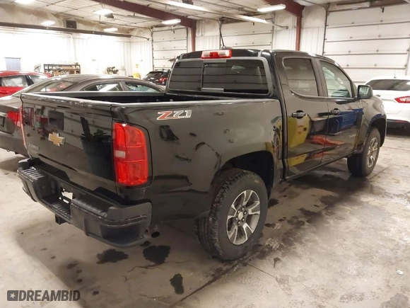2016 Chevrolet Colorado 4WD Z71 with VIN 1GCGTDE32G1250263, listed as a IAAI auction lot 41823922 with 157,286 mi miles. Bid and sale history available at carsss.com. Image 4.