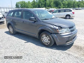 2015 Dodge Journey American Value z VIN 3C4PDCAB2FT713157, wystawiony jako IAAI lot #42128470 z przebiegiem 197 153 mil mil oraz . Historia ofert i sprzedaży dostępna na DreamBid. Obrazek 1.