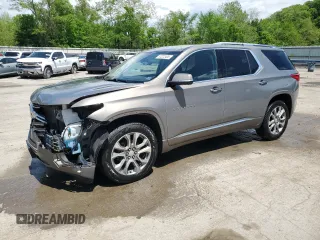 2018 Chevrolet Traverse Premier z VIN 1GNEVJKW5JJ145536, wystawiony jako Copart lot #57222405 z przebiegiem 103 788 mil mil oraz Szkoda całkowita • Salvage title. Historia ofert i sprzedaży dostępna na DreamBid. Obrazek 1.