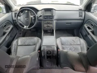 2003 Honda Pilot EX z VIN 2HKYF18763H581343, wystawiony jako Copart lot #60804525 z przebiegiem 236 636 mil mil oraz Szkoda całkowita • Salvage title. Historia ofert i sprzedaży dostępna na DreamBid. Obrazek 8.