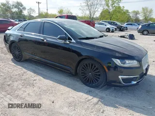 2017 Lincoln MKZ Reserve z VIN 3LN6L5E91HR605349, wystawiony jako IAAI lot #42210989 z przebiegiem 81 395 mil mil oraz . Historia ofert i sprzedaży dostępna na DreamBid. Obrazek 1.