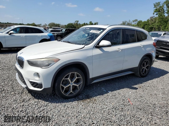 2018 BMW X1 sDrive28i with VIN WBXHU7C32J5L07666, listed as a Copart auction lot 54173465 with 132,514 mi miles and Clean Title. Bid and sale history available at DreamBid. Image 1.