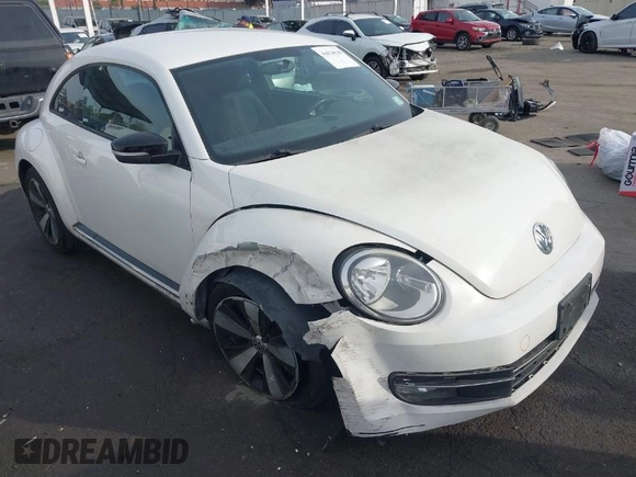 2012 Volkswagen Beetle 2.0T Turbo w/Sun/Snd/Nav PZEV with VIN 3VWVA7ATXCM620731, listed as a IAAI auction lot 41074530 with 99,236 mi miles. Bid and sale history available at carsss.com. Image 1.