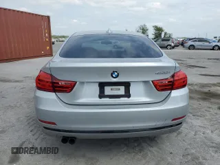 2015 BMW 4 Series 428i xDrive with VIN WBA4C9C55FD331210, listed as a Copart auction lot 54158235 with 88,372 mi miles and Salvage title. Bid and sale history available at DreamBid. Image 6.