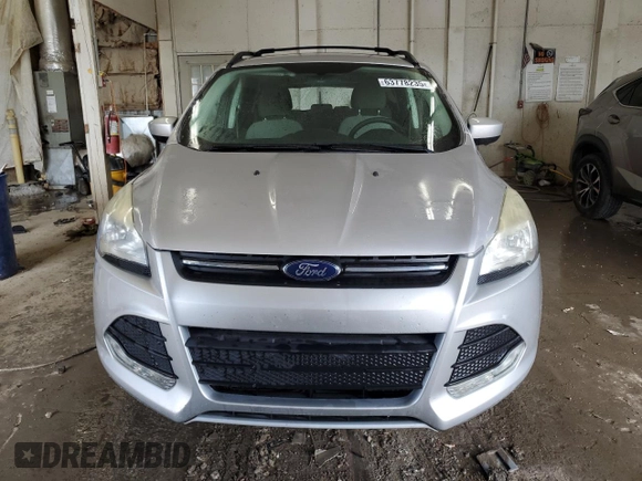 2013 Ford Escape SE with VIN 1FMCU9GX3DUD32274, listed as a Copart auction lot 63778235 with 161,288 mi miles and Salvage title. Bid and sale history available at DreamBid. Image 5.
