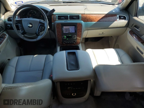 2007 Chevrolet Tahoe LTZ with VIN 1GNFC13J57R181007, listed as a Copart auction lot 56376455 with 202,161 mi miles and Salvage title. Bid and sale history available at DreamBid. Image 8.