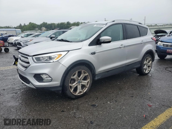 2019 Ford Escape Titanium z VIN 1FMCU9J99KUB44026, wystawiony jako Copart lot #58495855 z przebiegiem 106 361 mil mil oraz Szkoda całkowita • Salvage title. Historia ofert i sprzedaży dostępna na DreamBid. Obrazek 1.
