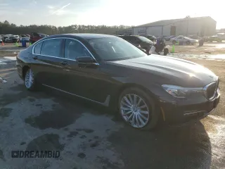 2017 BMW 7 Series 740i xDrive with VIN WBA7E4C50HGU99073, listed as a Copart auction lot 86506784 with 107,109 mi miles and Salvage Title. Bid and sale history available at carsss.com. Image 4.