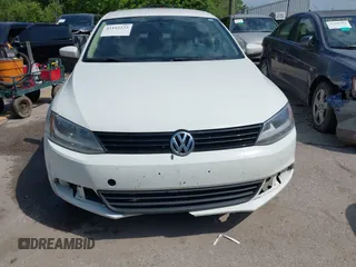2011 Volkswagen Jetta SE z VIN 3VWDX7AJ4BM052225, wystawiony jako IAAI lot #42192222 z przebiegiem 324 889 mil mil oraz . Historia ofert i sprzedaży dostępna na DreamBid. Obrazek 6.