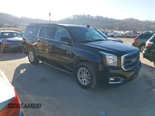 2016 GMC Yukon XL SLT with VIN 1GKS2GKC2GR394579, listed as a IAAI auction lot 41575879 with 158,715 mi miles. Bid and sale history available at carsss.com. Image 1.
