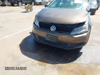 2014 Volkswagen Jetta S with VIN 3VW2K7AJ8EM319182, listed as a IAAI auction lot 42180101 with 133,495 mi miles and . Bid and sale history available at DreamBid. Image 12.