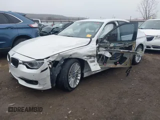 2014 BMW 3 Series 335i with VIN WBA3A9G50ENS65136, listed as a IAAI auction lot 41504021 with 60,892 mi miles. Bid and sale history available at carsss.com. Image 2.