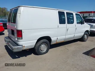 1999 Ford Econoline Cargo with VIN 1FTRE1421XHB21609, listed as a IAAI auction lot 42070347 with 103,104 mi miles. Bid and sale history available at carsss.com. Image 4.