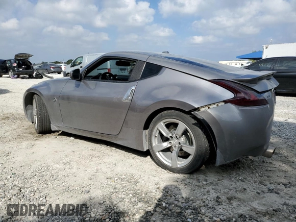 2009 Nissan 370Z z VIN JN1AZ44E69M405389, wystawiony jako Copart lot #43340975 z przebiegiem 31 521 mil mil oraz Szkoda całkowita • Salvage title. Historia ofert i sprzedaży dostępna na DreamBid. Obrazek 2.