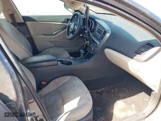 2015 Kia Optima LX with VIN KNAGM4A71F5634755, listed as a IAAI auction lot 42019729 with 101,064 mi miles. Bid and sale history available at carsss.com. Image 5.