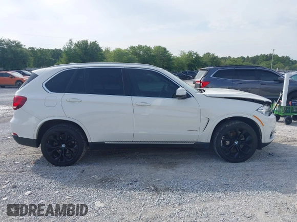 2016 BMW X5 xDrive35i z VIN 5UXKR0C55G0P32557, wystawiony jako IAAI lot #42235246 z przebiegiem 104 947 mil mil oraz . Historia ofert i sprzedaży dostępna na DreamBid. Obrazek 13.