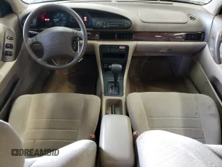 1996 Nissan Altima XE z VIN 1N4BU31D0TC137724, wystawiony jako Copart lot #71544394 z przebiegiem 122 704 mil mil oraz Czysty tytuł • Clean title. Historia ofert i sprzedaży dostępna na DreamBid. Obrazek 8.