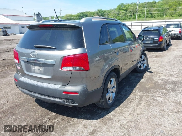 2012 Kia Sorento EX with VIN 5XYKUDA61CG244312, listed as a IAAI auction lot 42343888 with 164,520 mi miles and . Bid and sale history available at DreamBid. Image 4.