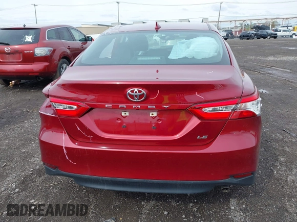 2019 Toyota Camry LE with VIN 4T1B11HK8KU823736, listed as a IAAI auction lot 42166696 with 21,732 mi miles and . Bid and sale history available at DreamBid. Image 16.