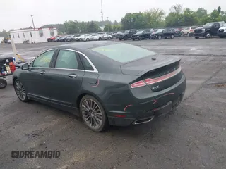 2015 Lincoln MKZ Hybrid z VIN 3LN6L2LU7FR618867, wystawiony jako IAAI lot #42291650 z przebiegiem 109 021 mil mil oraz . Historia ofert i sprzedaży dostępna na DreamBid. Obrazek 3.
