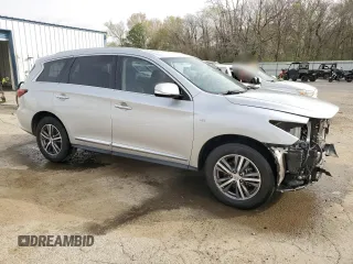 2017 Infiniti QX60 with VIN 5N1DL0MN4HC507133, listed as a Copart auction lot 48823865 with 184,428 mi miles and Salvage Title. Bid and sale history available at carsss.com. Image 4.
