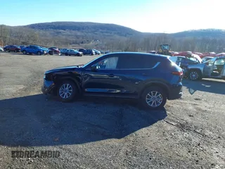 2023 Mazda CX-5 2.5 S Select Package with VIN JM3KFBBM3P0197783, listed as a IAAI auction lot 40989935 with 11,833 mi miles. Bid and sale history available at carsss.com. Image 14.
