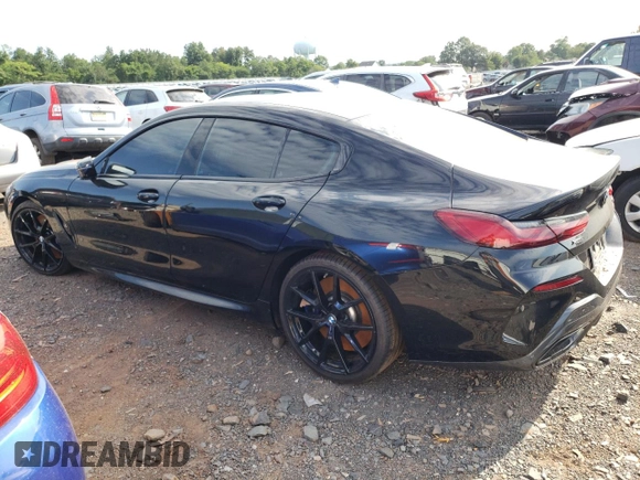 2022 BMW 8 Series M850i with VIN WBAGV8C01NCH65668, listed as a Copart auction lot 61305903 with 0 mi miles. Bid and sale history available at carsss.com. Image 2.
