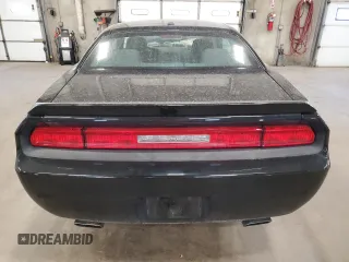 2013 Dodge Challenger R/T z VIN 2C3CDYBT9DH501059, wystawiony jako Copart lot #55139865 z przebiegiem 95 112 mil mil oraz Szkoda całkowita • Salvage title. Historia ofert i sprzedaży dostępna na DreamBid. Obrazek 6.