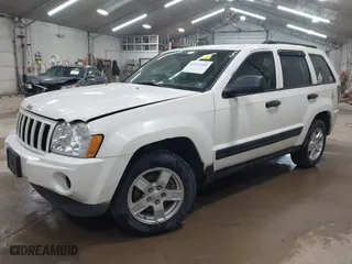 2006 Jeep Grand Cherokee Laredo with VIN 1J8GR48K06C163877, listed as a IAAI auction lot 41971240 with 250,544 mi miles. Bid and sale history available at carsss.com. Image 2.