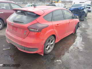 2015 Ford Focus ST with VIN 1FADP3L94FL323828, listed as a IAAI auction lot 41650672 with 101,511 mi miles. Bid and sale history available at carsss.com. Image 4.
