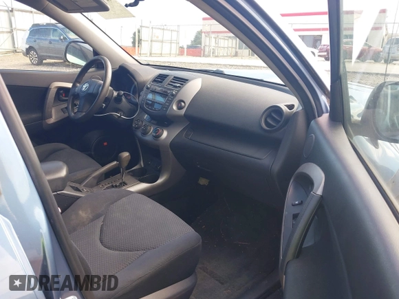 2006 Toyota RAV4 Sport with VIN JTMZK32VX65005116, listed as a IAAI auction lot 42706208 with 201,935 mi miles and . Bid and sale history available at DreamBid. Image 5.