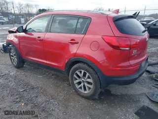2014 Kia Sportage LX with VIN KNDPBCAC1E7577492, listed as a IAAI auction lot 41606524 with 165301 miles. Bid and sale history available at carsss.com. Image 3.