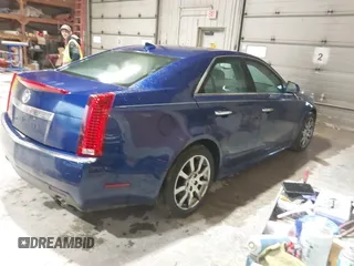 2012 Cadillac CTS Luxury z VIN 1G6DG5E5XC0125819, wystawiony jako IAAI lot #42251305 z przebiegiem 233 887 mil mil oraz . Historia ofert i sprzedaży dostępna na DreamBid. Obrazek 4.