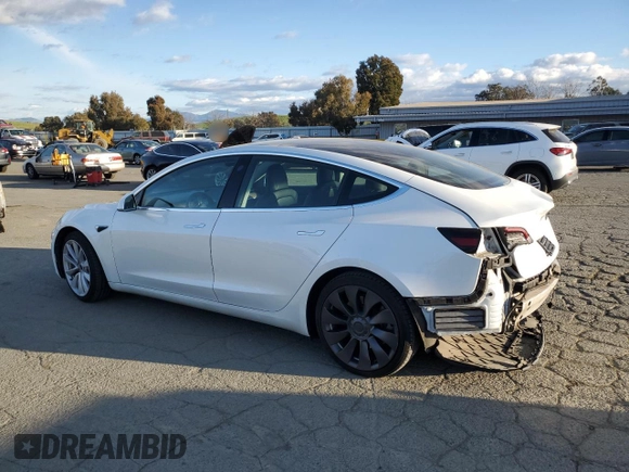 2020 Tesla Model 3 Standard Range Plus z VIN 5YJ3E1EA2LF709170, wystawiony jako Copart lot #47885075 z przebiegiem 126 550 mil mil oraz Szkoda całkowita • Salvage title. Historia ofert i sprzedaży dostępna na DreamBid. Obrazek 2.