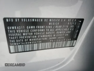 2013 Volkswagen Jetta SE z VIN 3VWDP7AJ8DM354734, wystawiony jako Copart lot #61147355 z przebiegiem 103 428 mil mil oraz Szkoda całkowita • Salvage title. Historia ofert i sprzedaży dostępna na DreamBid. Obrazek 13.