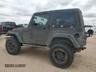 1998 Jeep Wrangler Sahara with VIN 1J4FY49S0WP749826, listed as a Copart auction lot 55174205 with 203,574 mi miles and Salvage title. Bid and sale history available at DreamBid. Image 2.