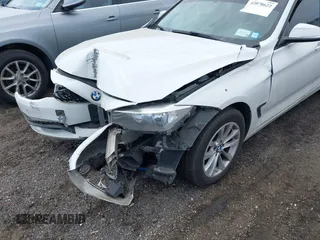 2014 BMW 3 Series GT 328i xDrive with VIN WBA3X5C5XED559713, listed as a IAAI auction lot 42078622 with 68,233 mi miles. Bid and sale history available at carsss.com. Image 18.