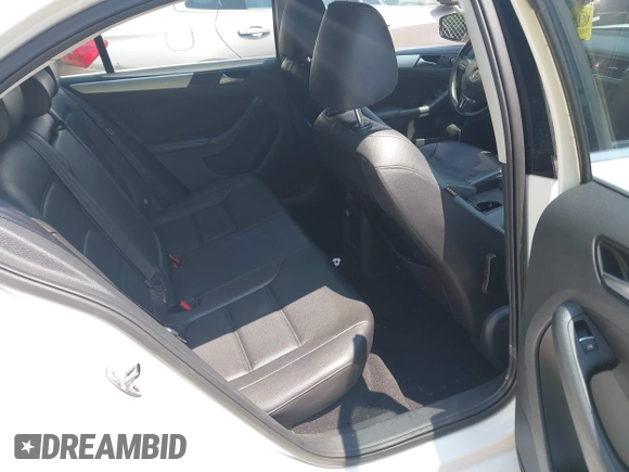 2014 Volkswagen Jetta SE with VIN 3VWD17AJ5EM437072, listed as a IAAI auction lot 42463048 with 99,030 mi miles and . Bid and sale history available at DreamBid. Image 8.