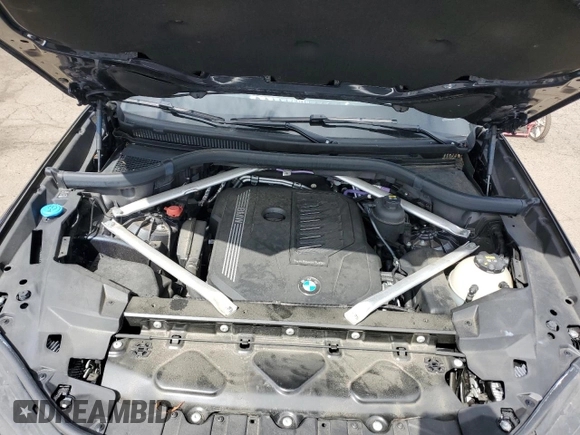 2022 BMW X5 xDrive40i z VIN 5UXCR6C04N9N31737, wystawiony jako Copart lot #57100295 z przebiegiem 26 125 mil mil oraz Szkoda całkowita • Salvage title. Historia ofert i sprzedaży dostępna na DreamBid. Obrazek 11.